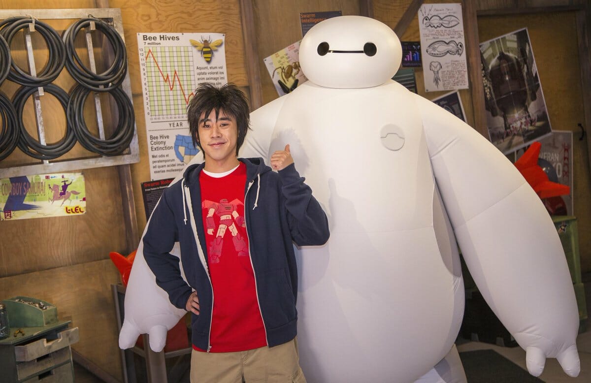 BigHero6 with kid taking a picture