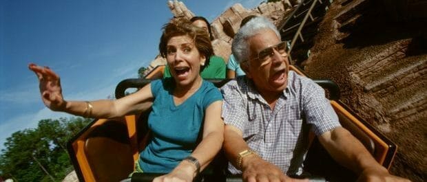 Seniors riding roller coaster in Disney World