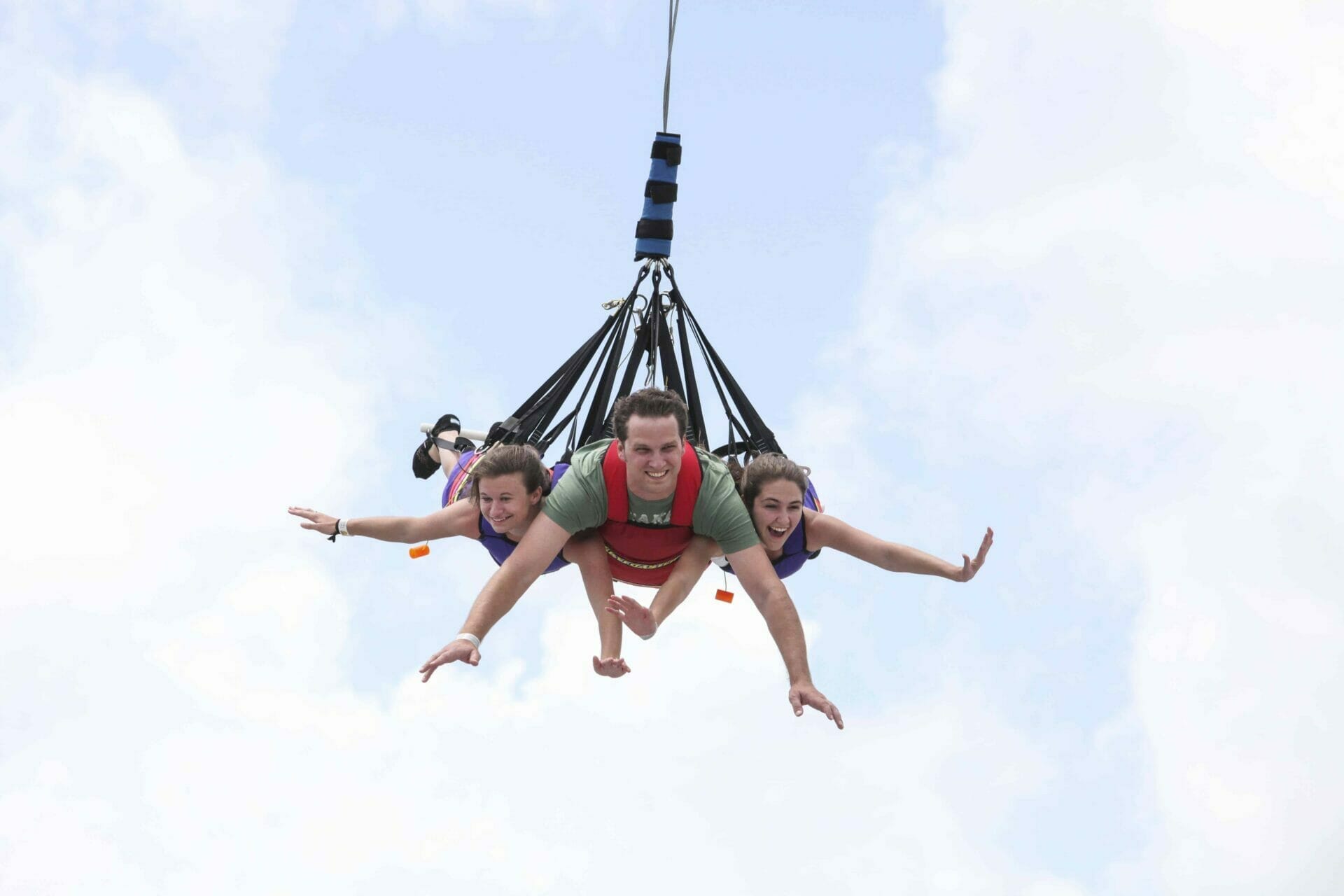 Family swinging high on the Skycoaster